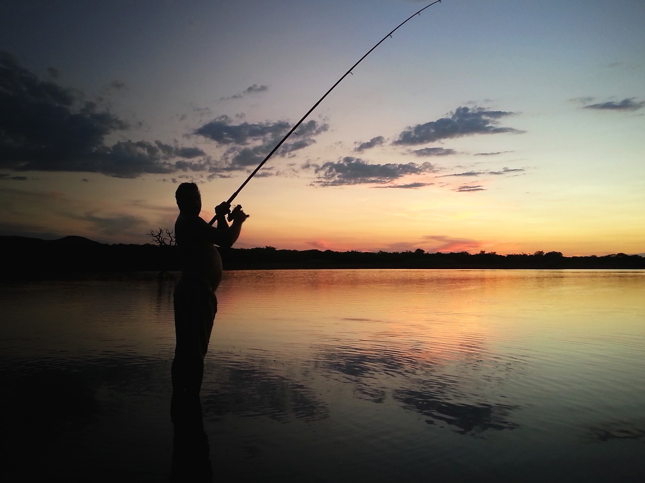 fishing sunset water free photo