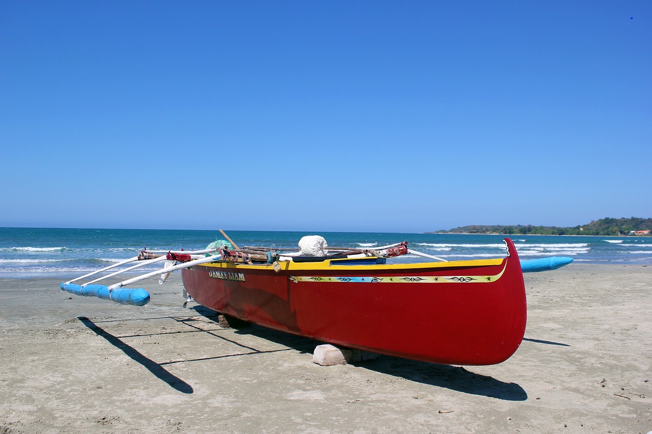 fishing boat beach ocean free photo