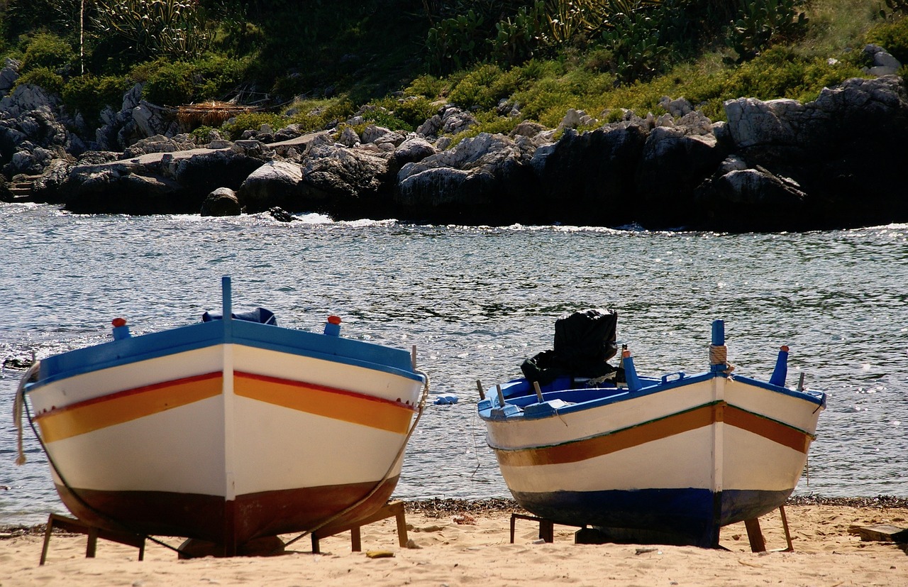 fishing boat  sicily  beach free photo