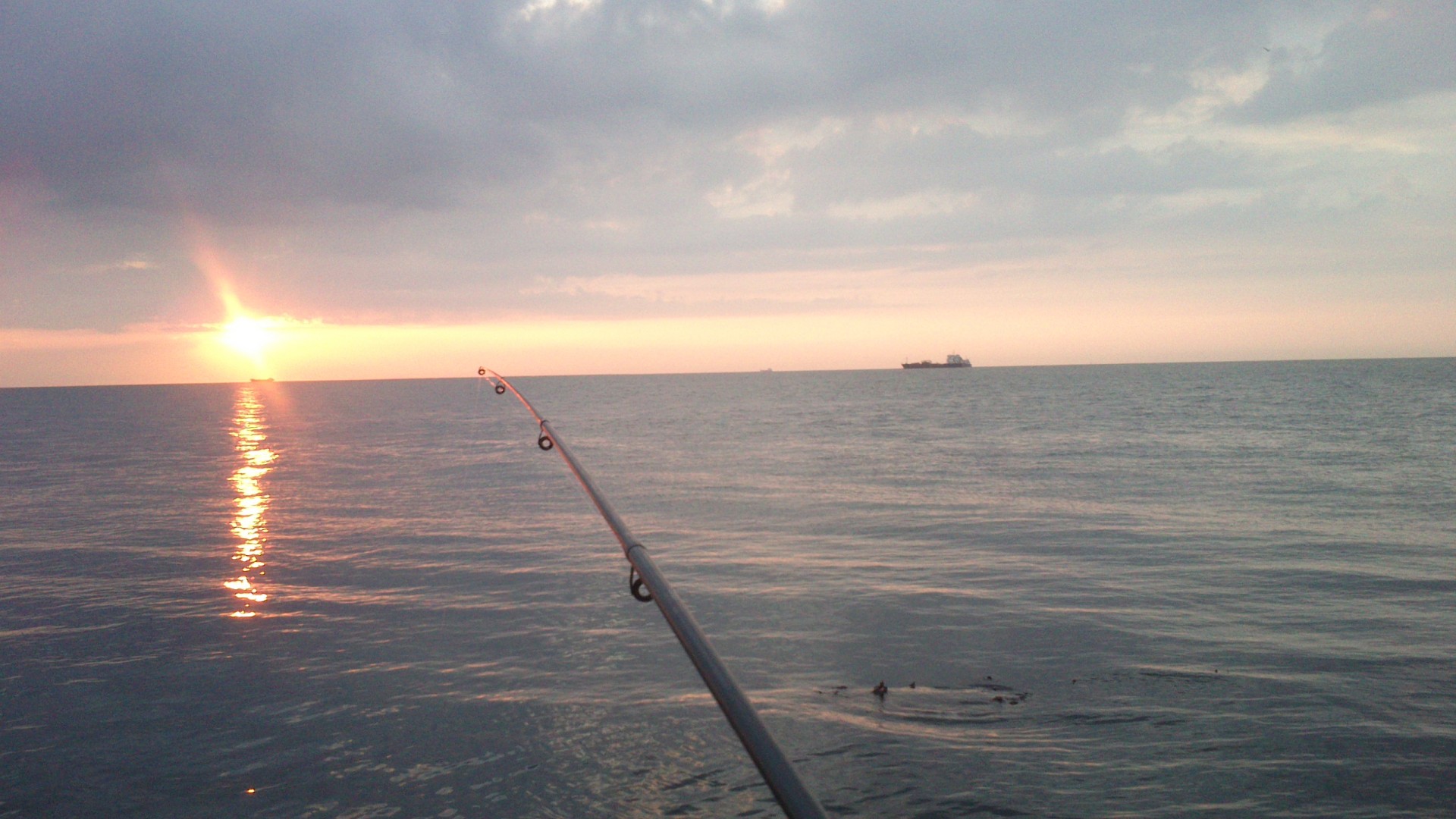 fishing rod sunset water free photo
