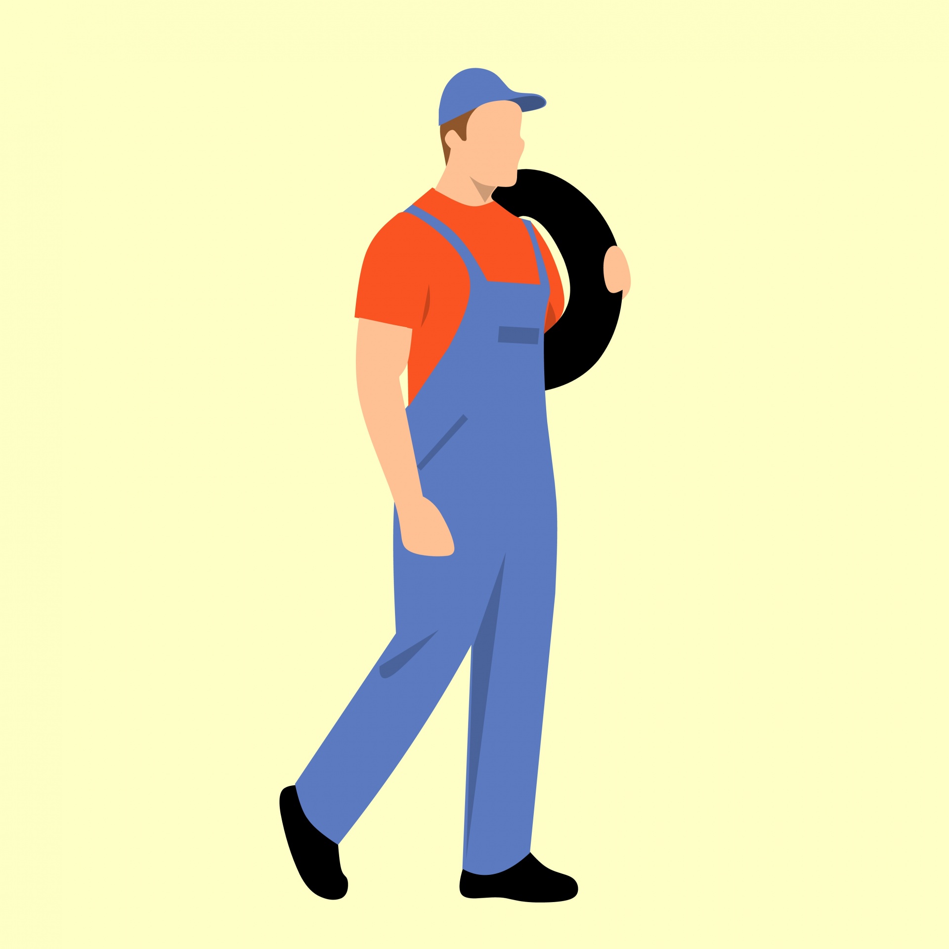 mechanic carrying tire isolated free photo