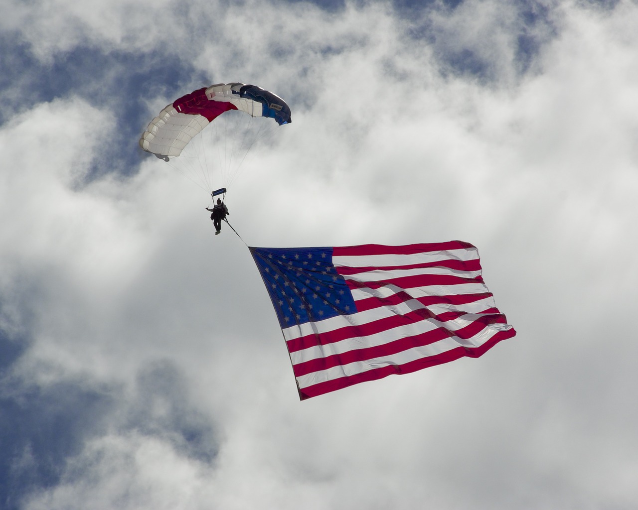 flag skydiver american free photo