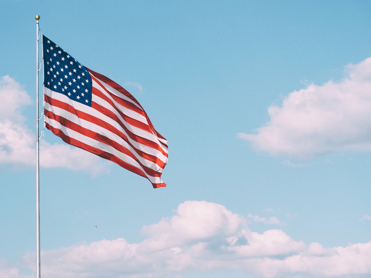 flag pole clouds free photo