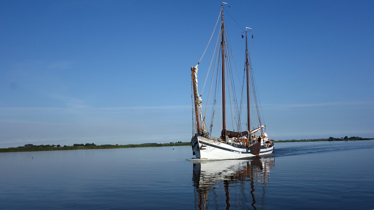 flat bottom boat sailing ship free photo