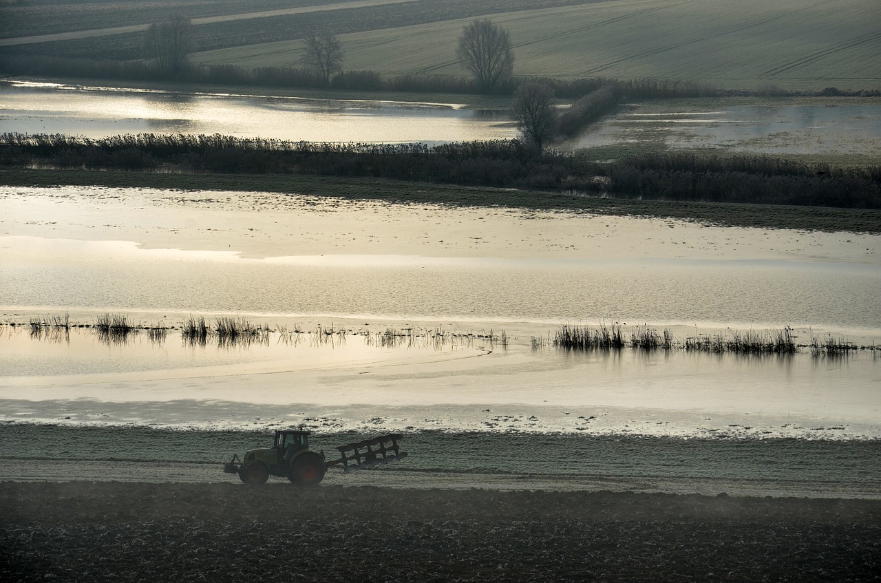 flood  tractor  river free photo