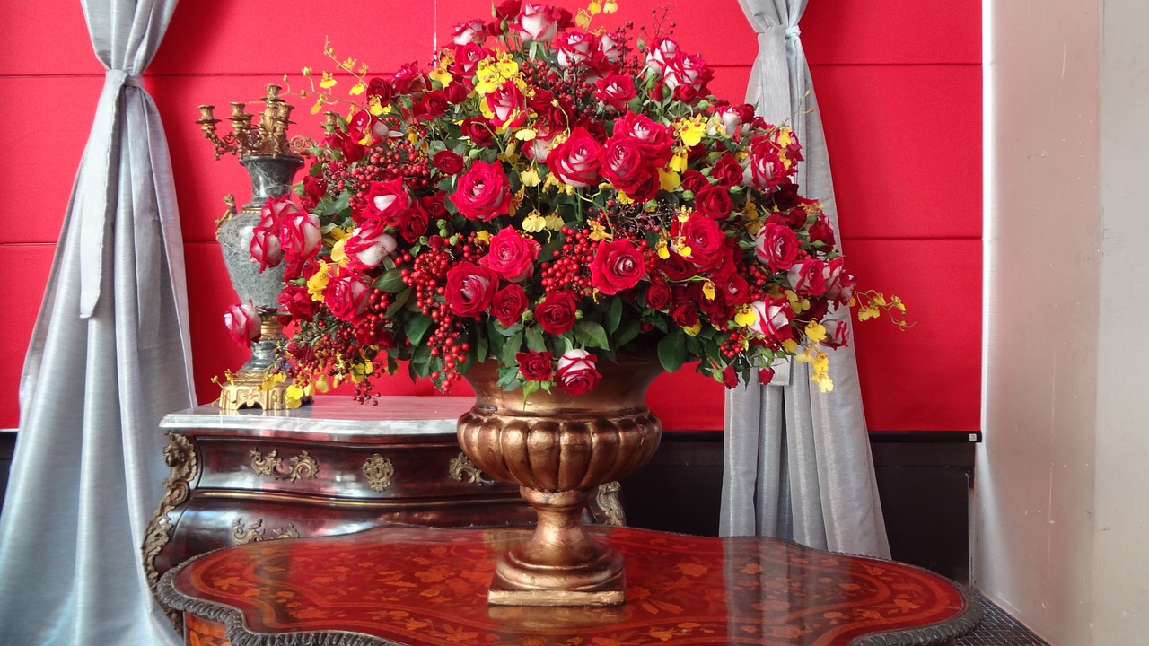 flower arrangement red roses vase of flowers free photo