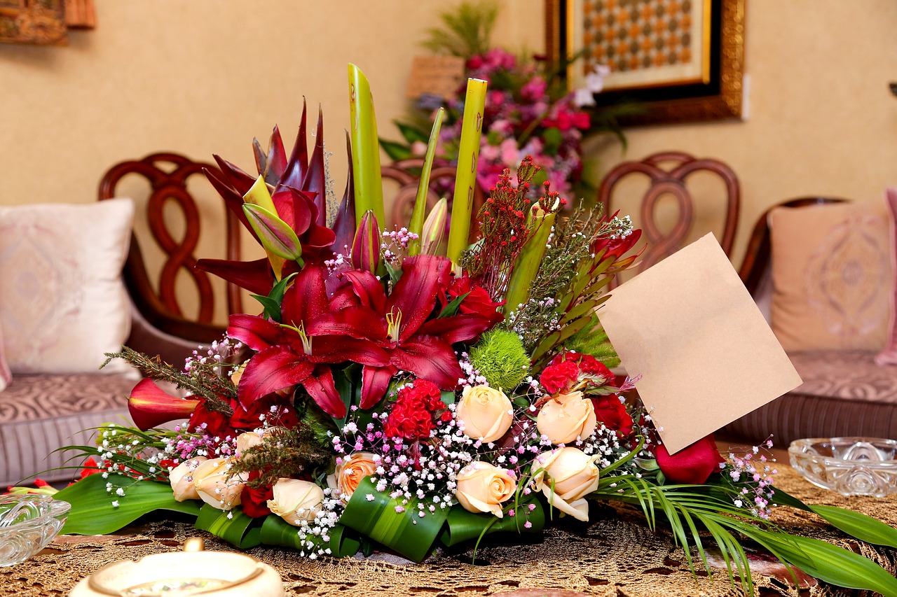 flower arrangement with card  bunch of flowers  flower arrangement free photo