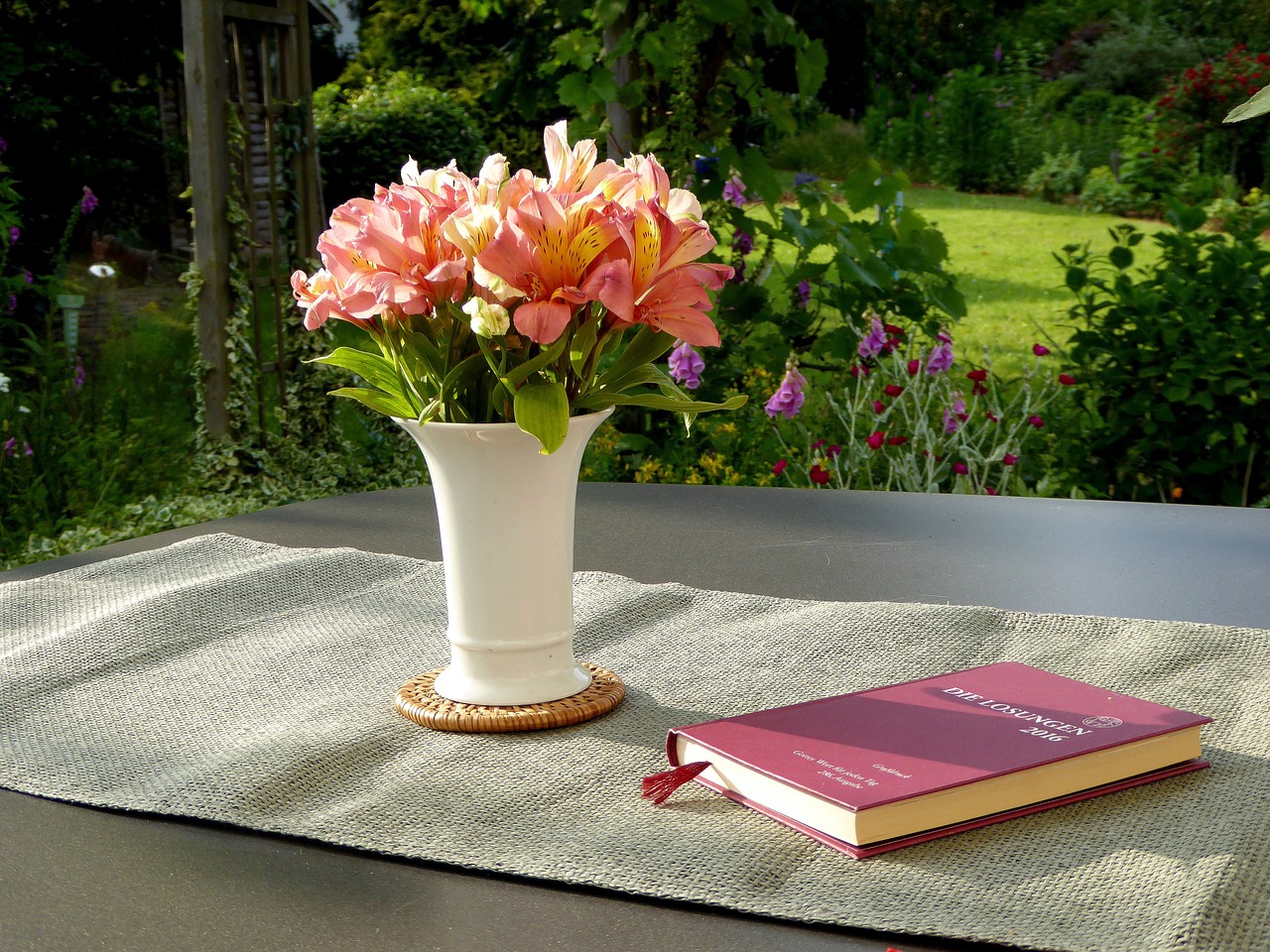 flower vase book flower orange free photo