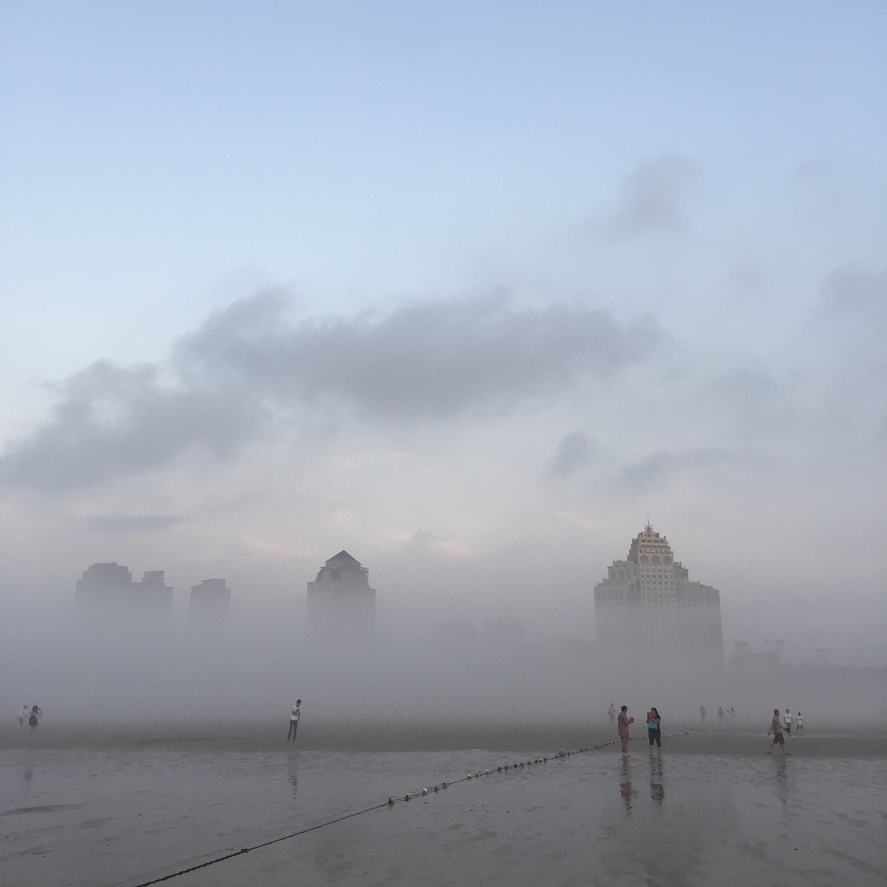fog early in the morning tall buildings free photo