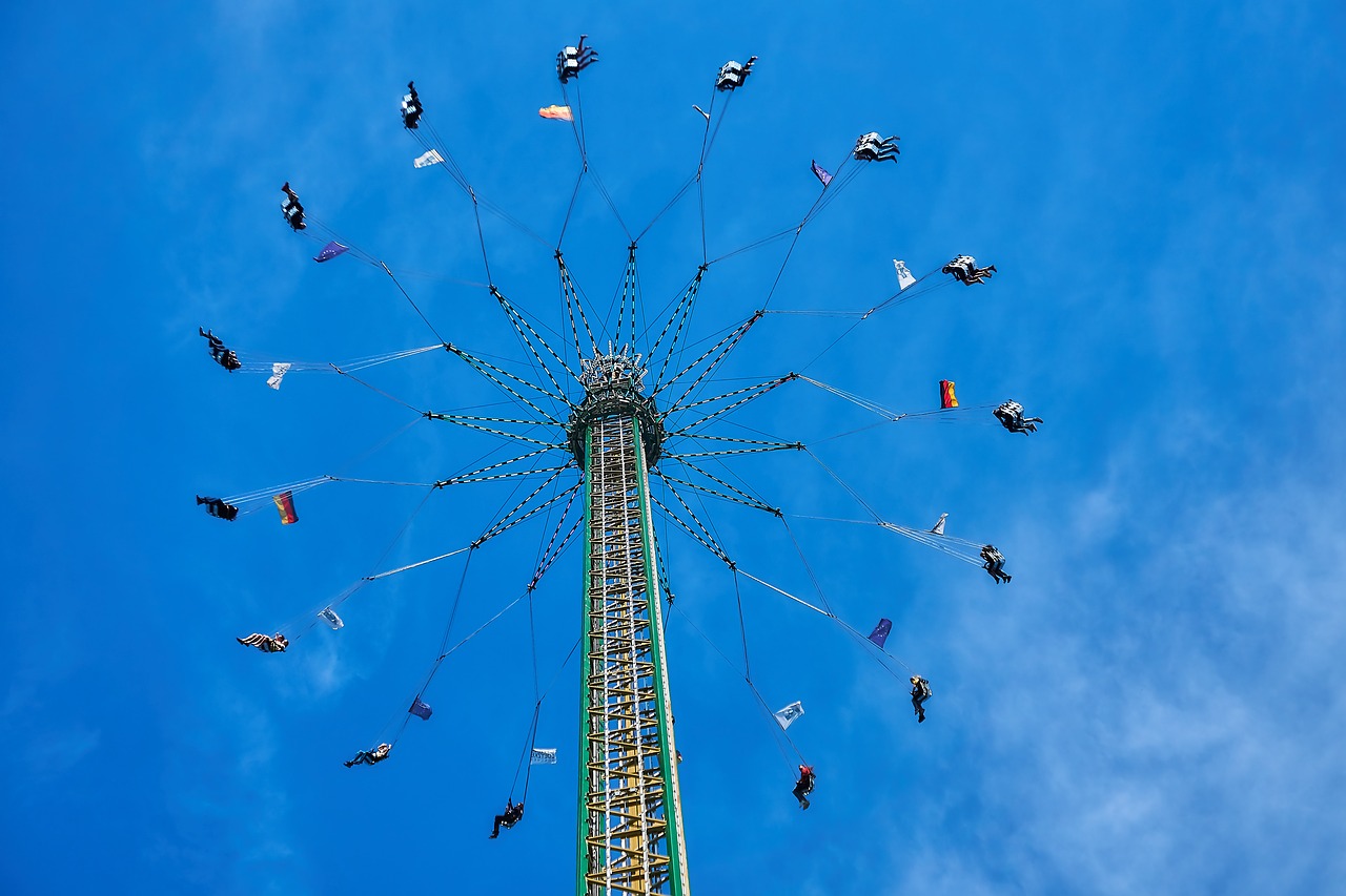 folk festival  chain carousel  year market free photo