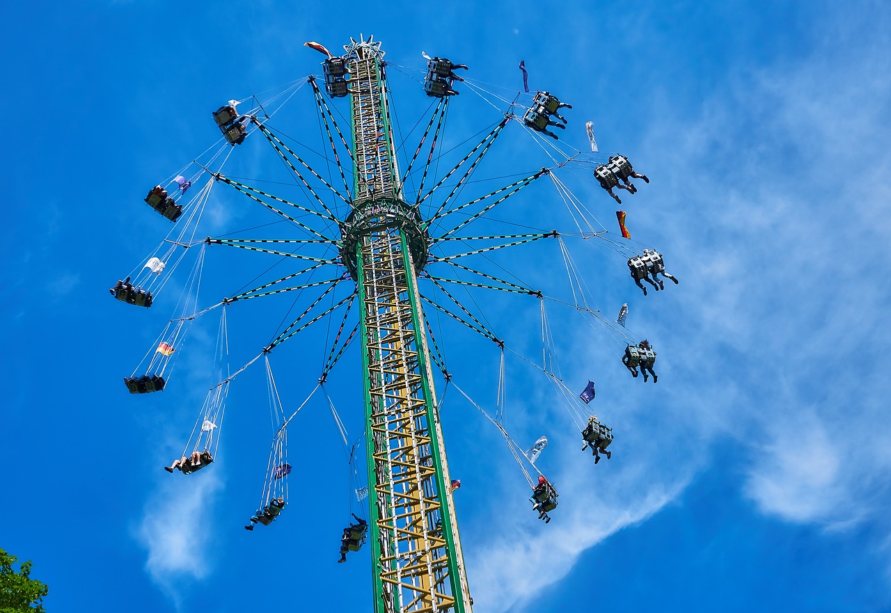 folk festival  chain carousel  year market free photo