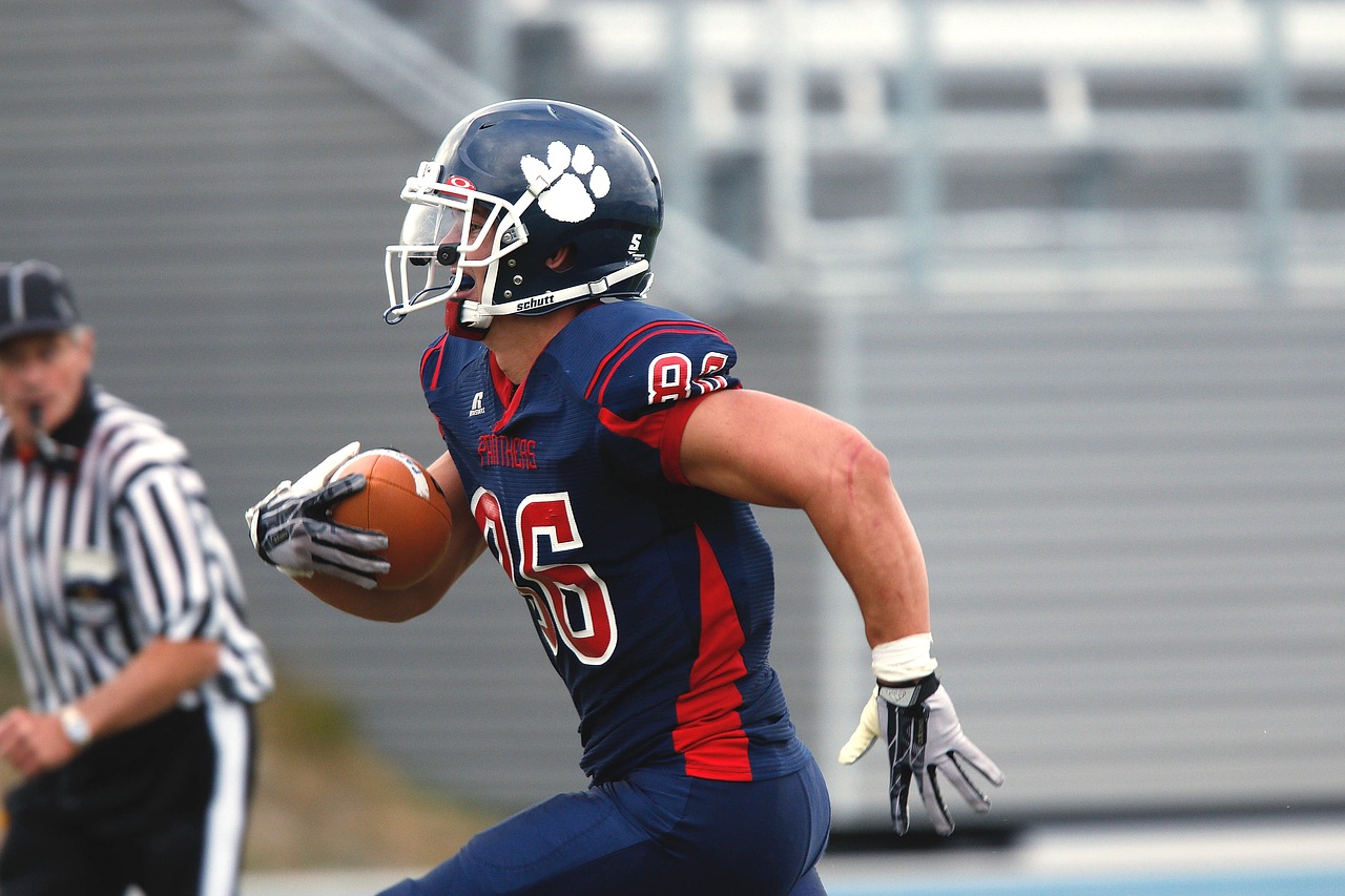 football ball carrier running free photo