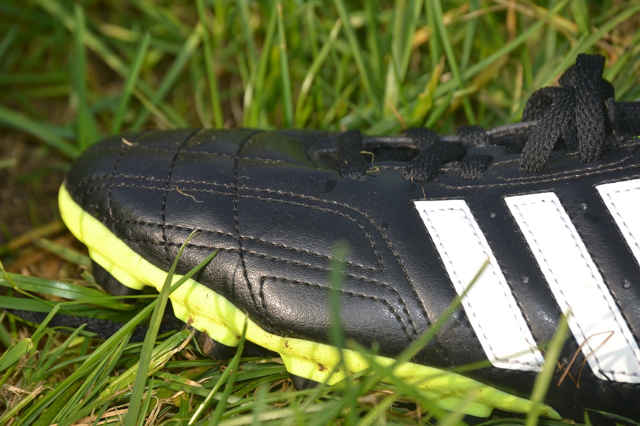 football boots shoe grass free photo