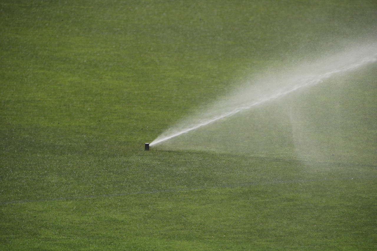 football field  spraying  football free photo