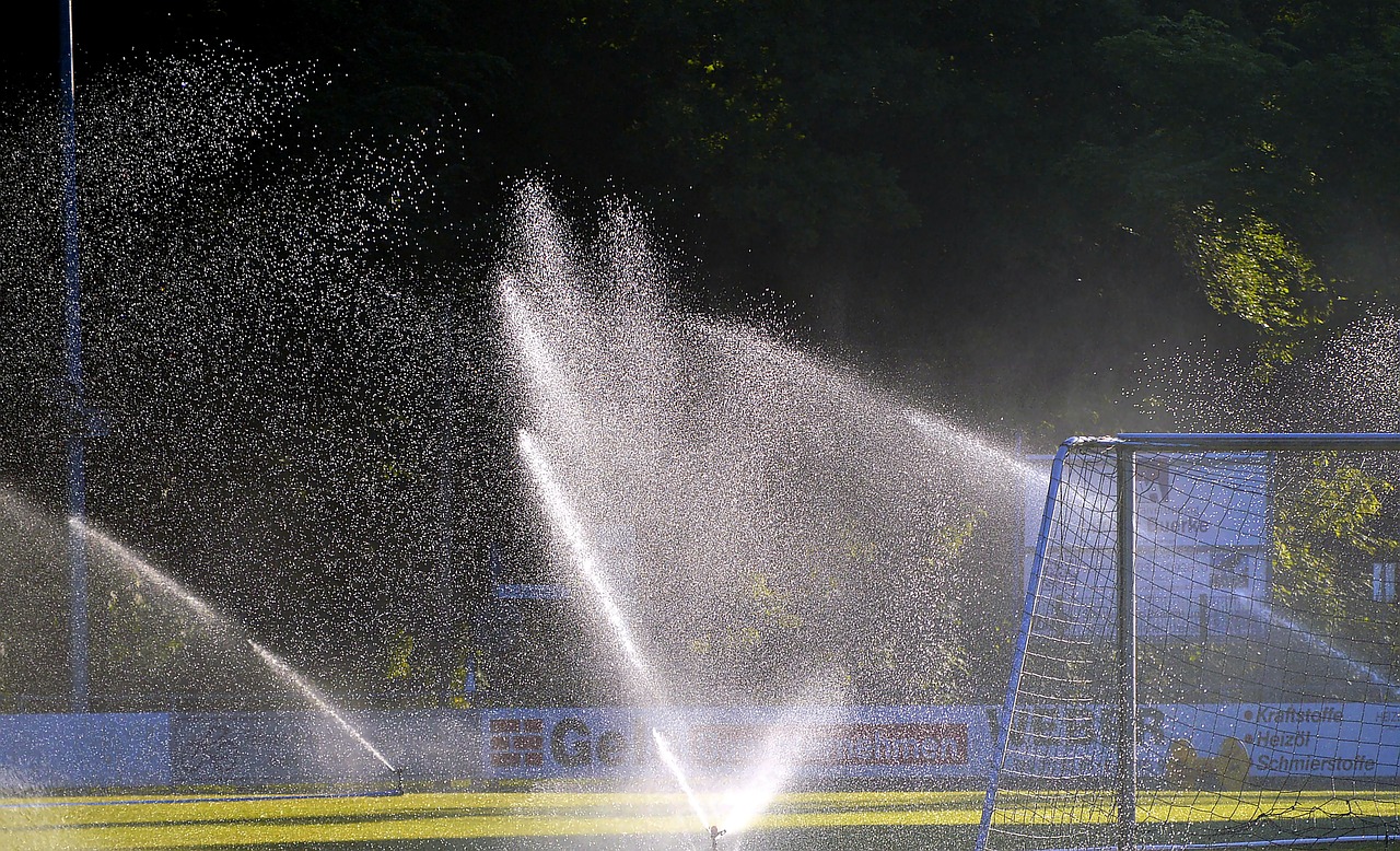 football pitch sprinkler system irrigation free photo