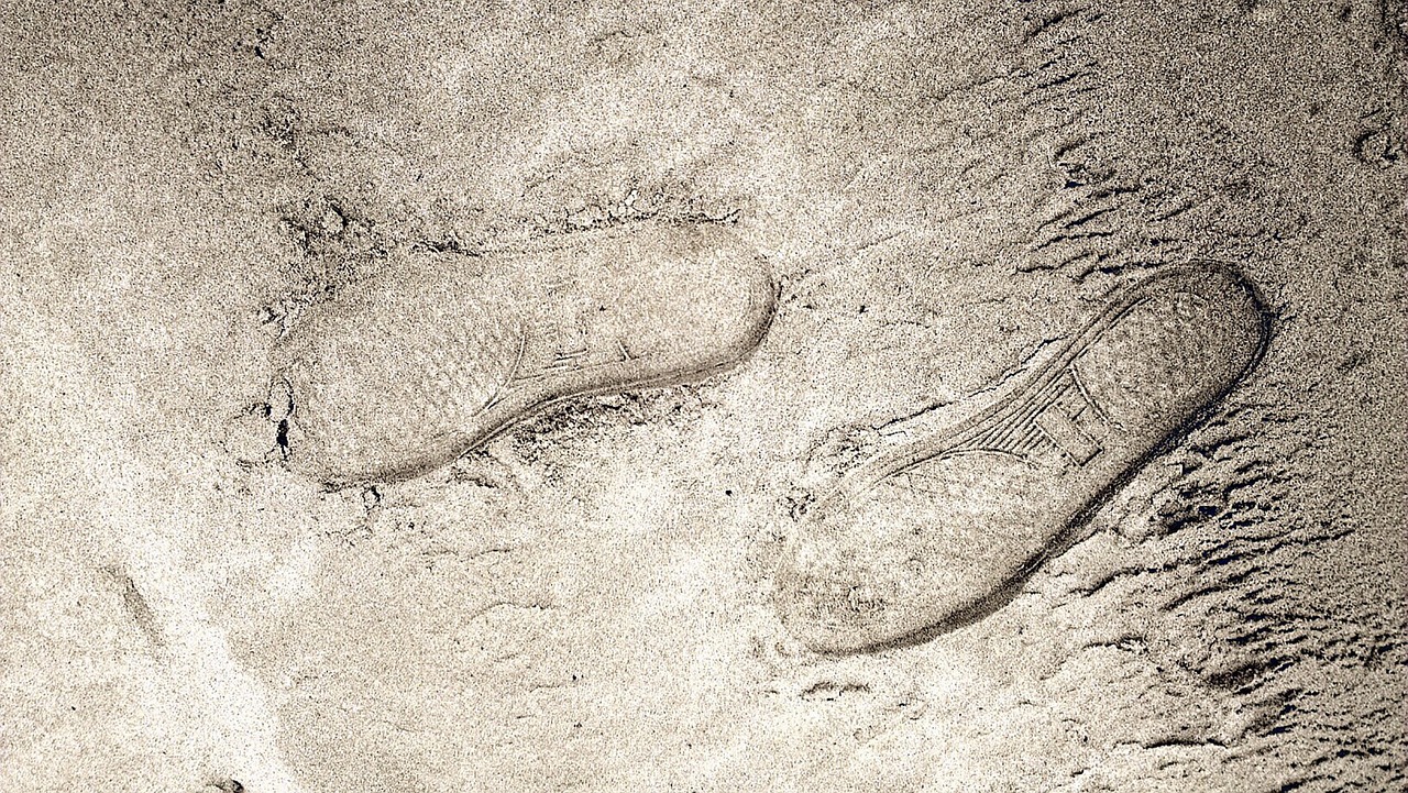 footprints sand beach free photo