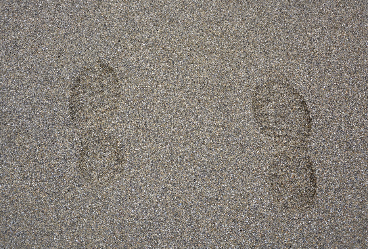 footprints feet beach sand free photo