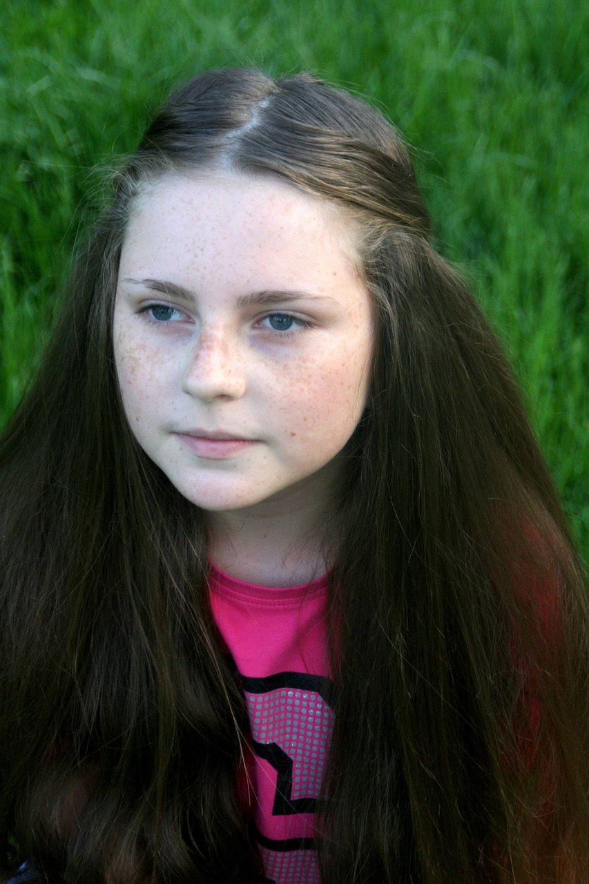 freckle face portrait grass free photo