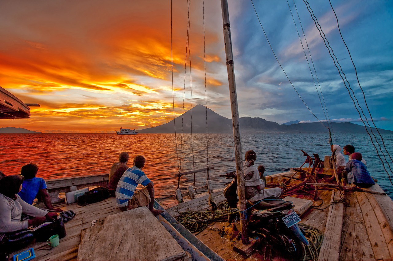 from on board landscape sunset wooden boats free photo