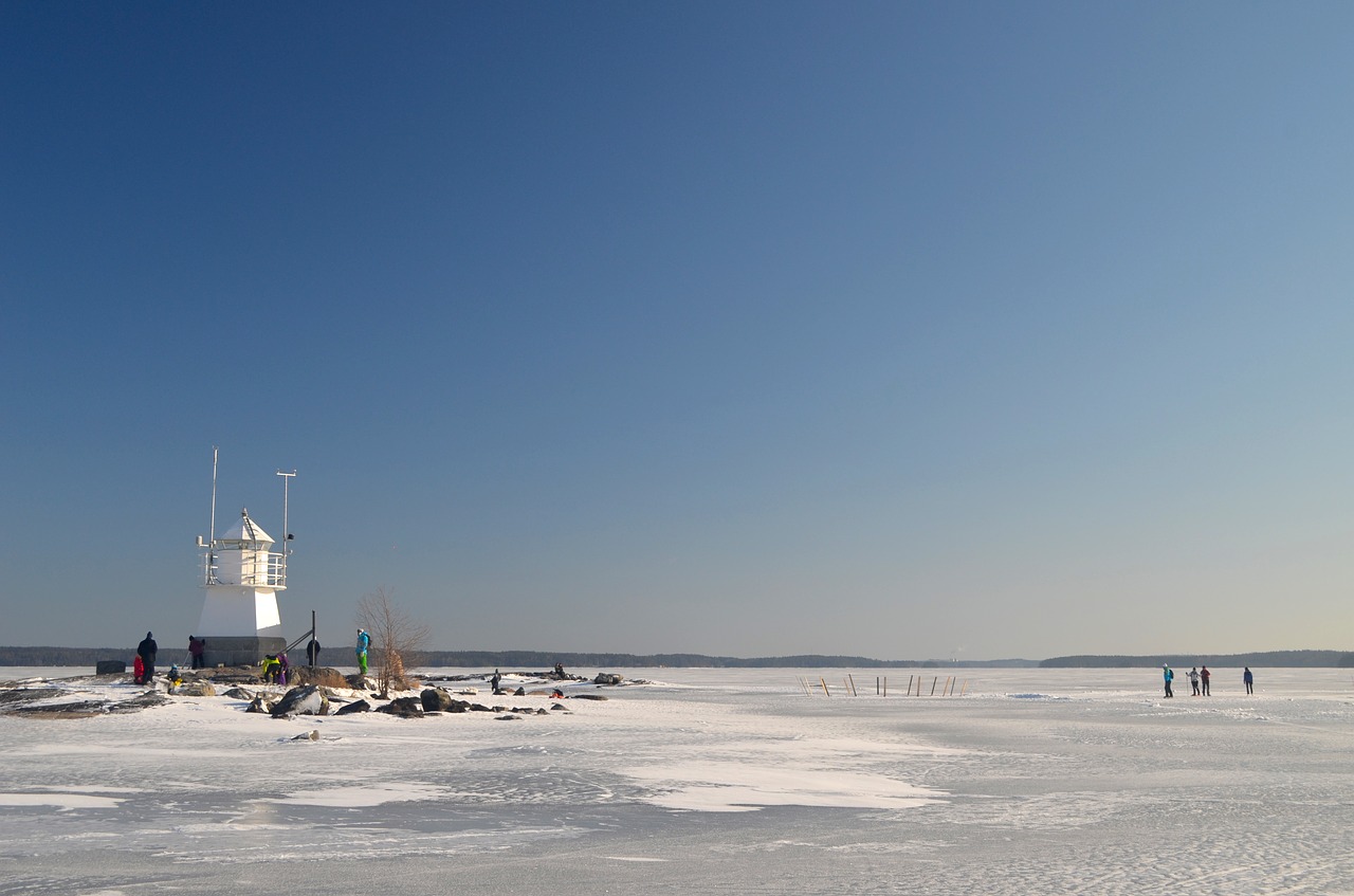 frozen lake lighthouse free photo