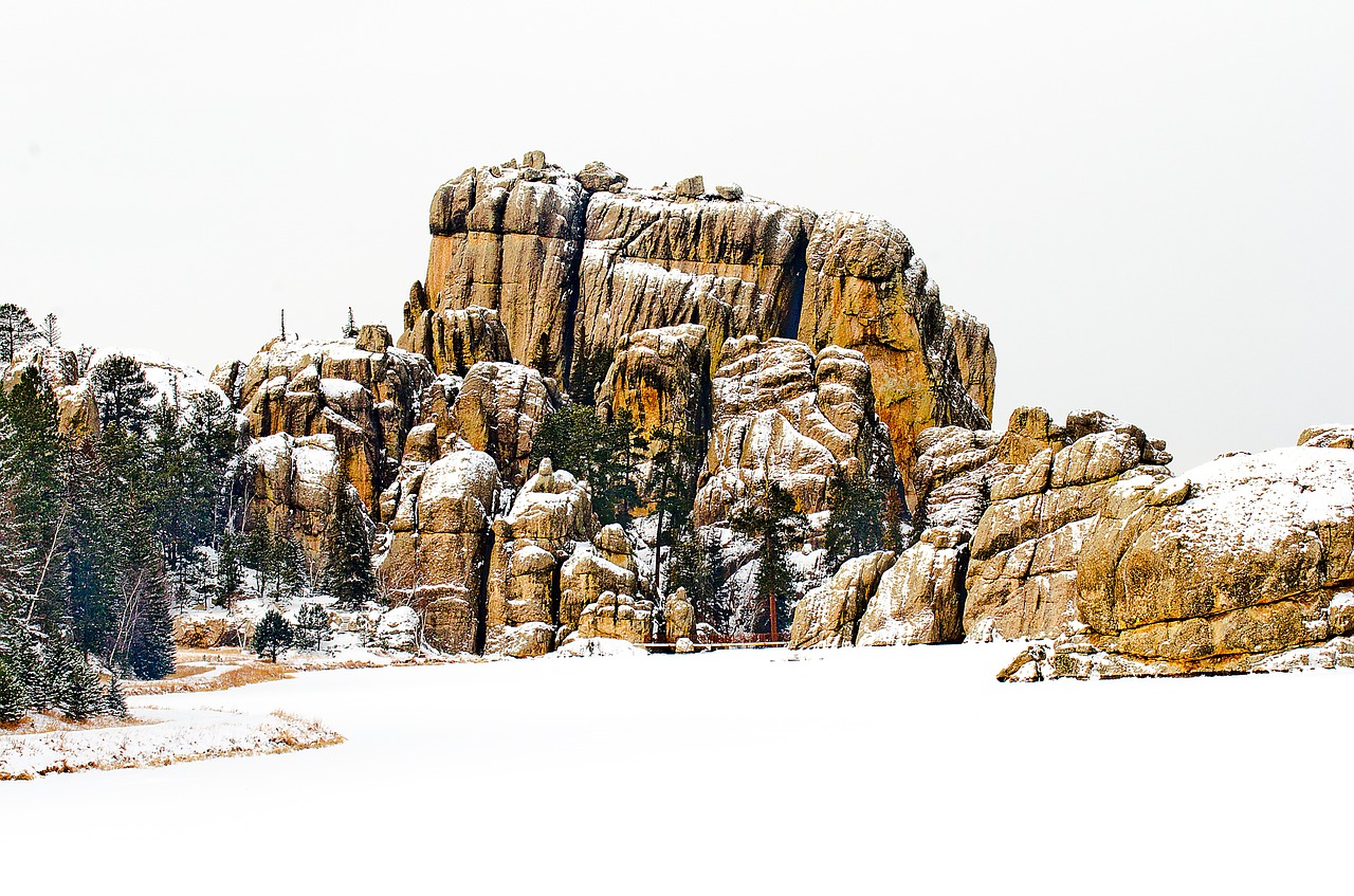 frozen lake rocks winter free photo