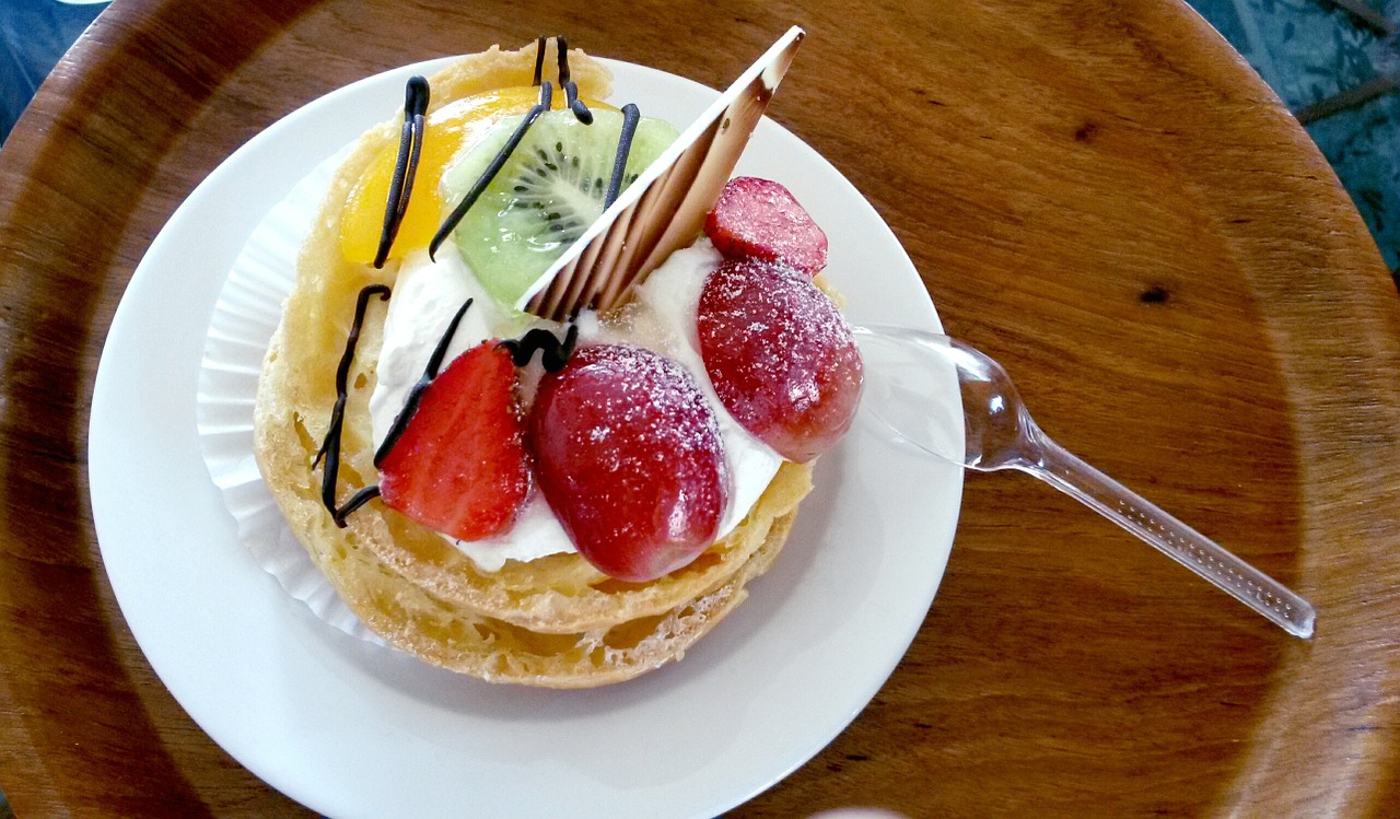 fruit-filled choux pastry pastry dessert free photo