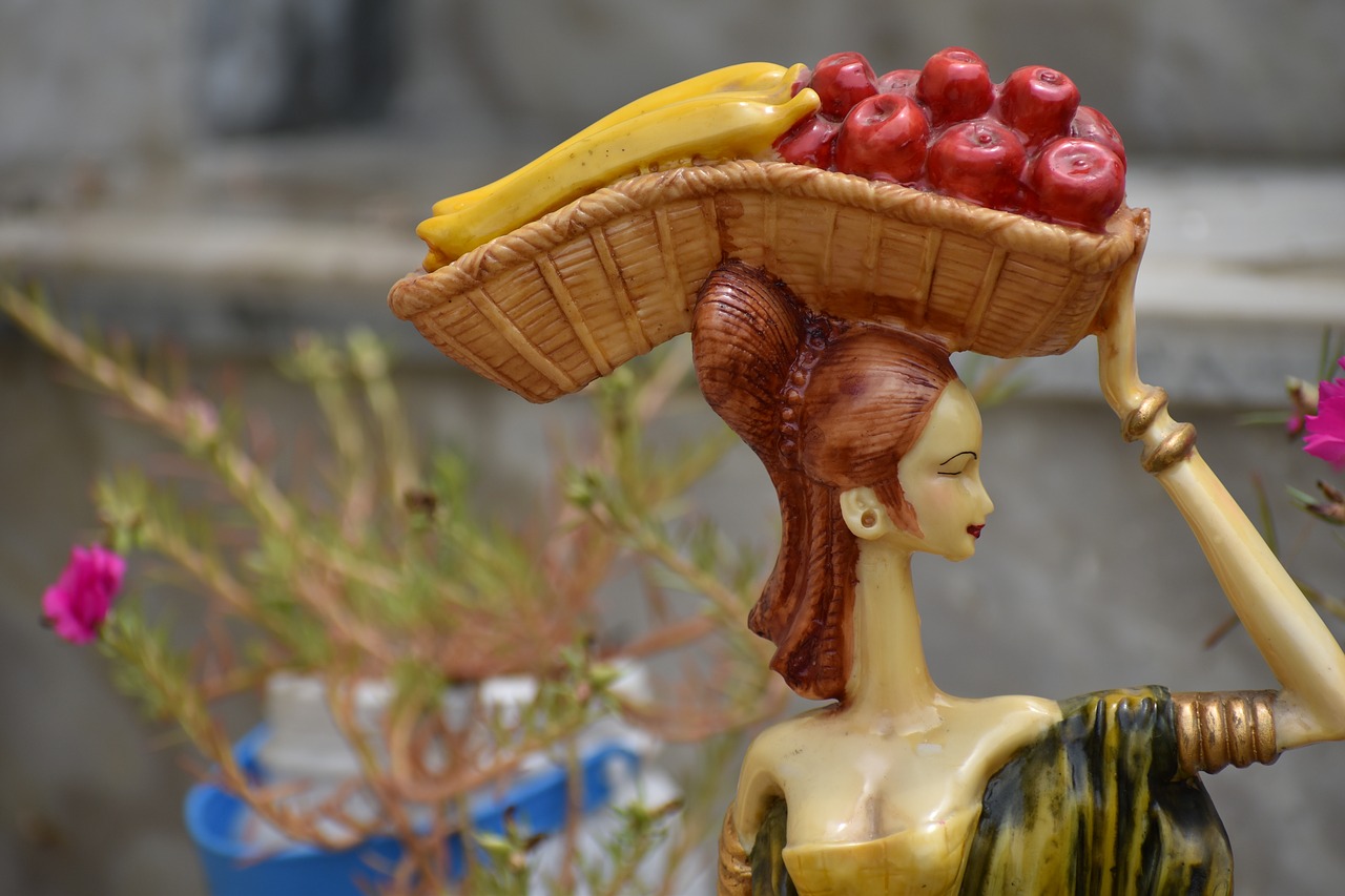 fruit woman seller figurine free photo