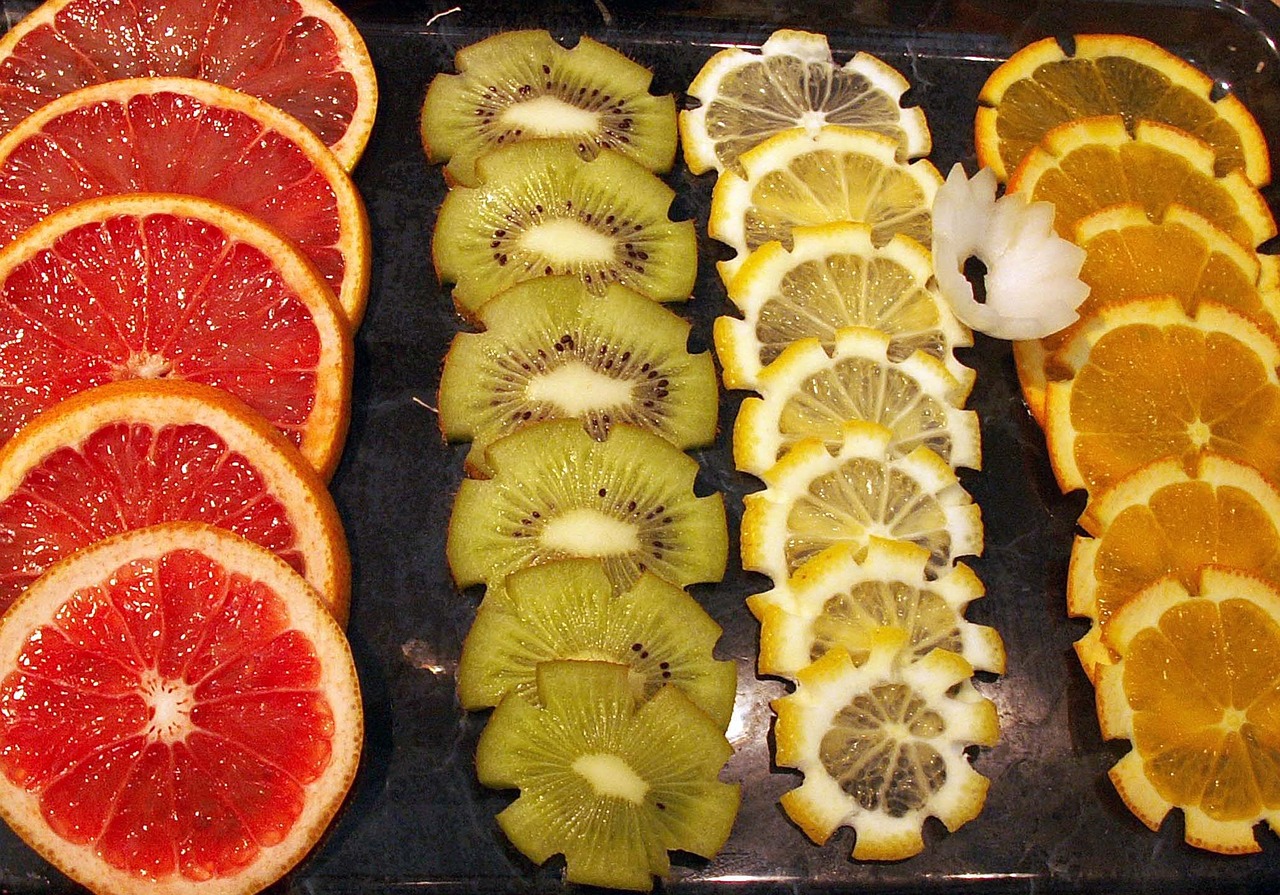 fruits oranges kiwi free photo