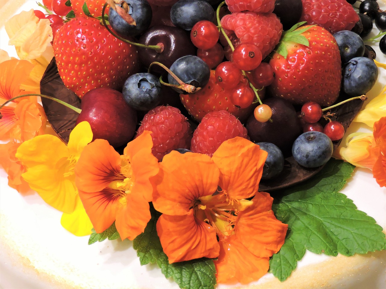 fruits nasturtium strawberry free photo