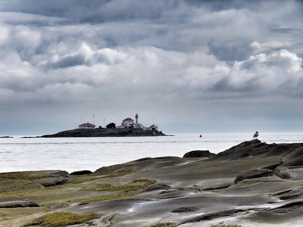 gabriola island lighthouse cloudy sky rocks free photo