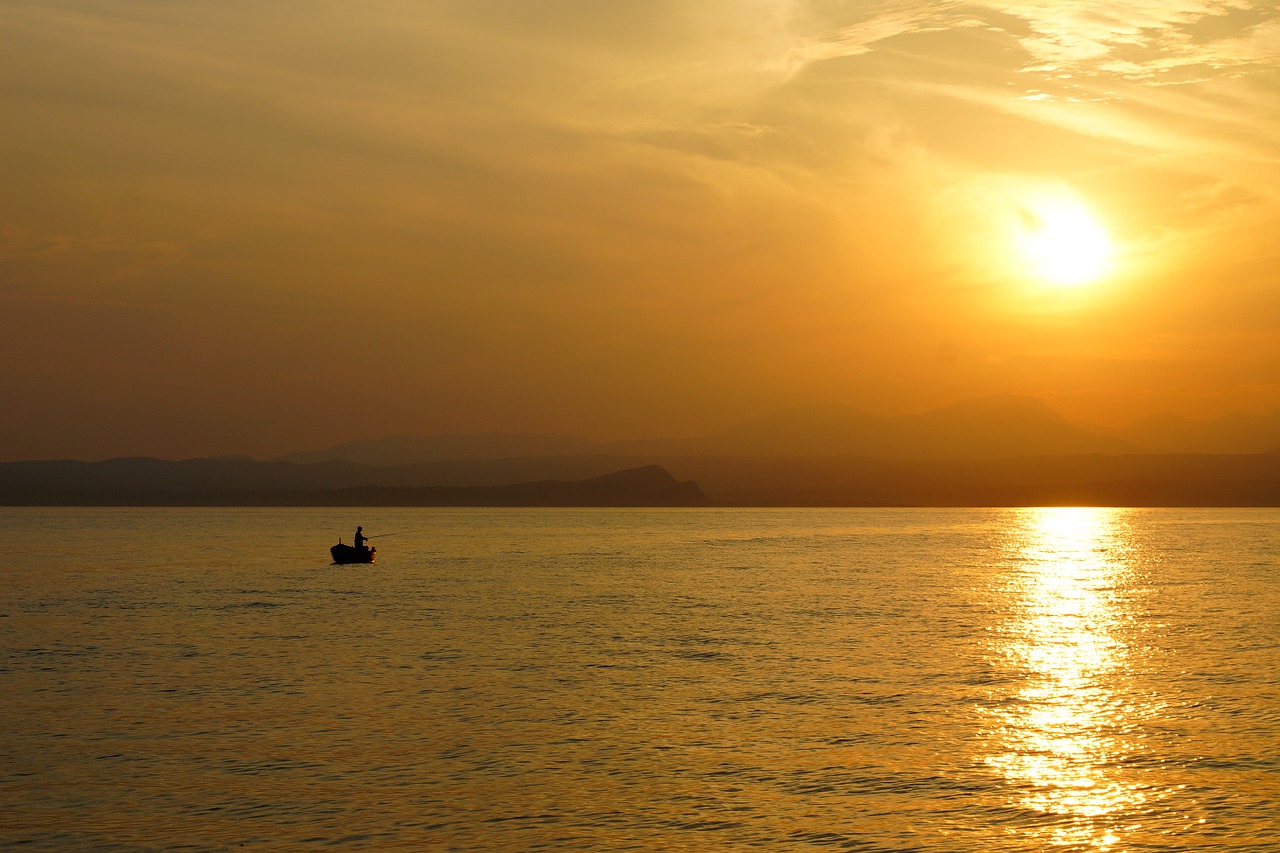 garda evening sun angler free photo