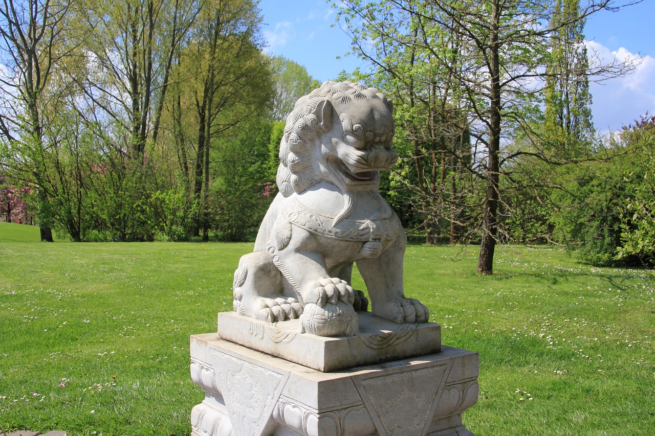 lion garden sculpture garden free photo