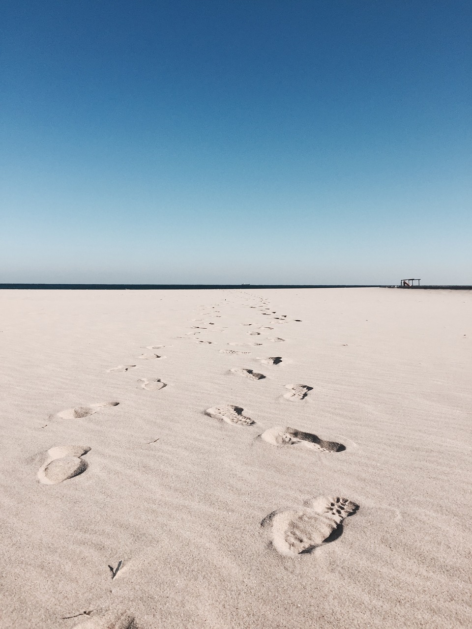 gil  following in the footsteps  beach free photo