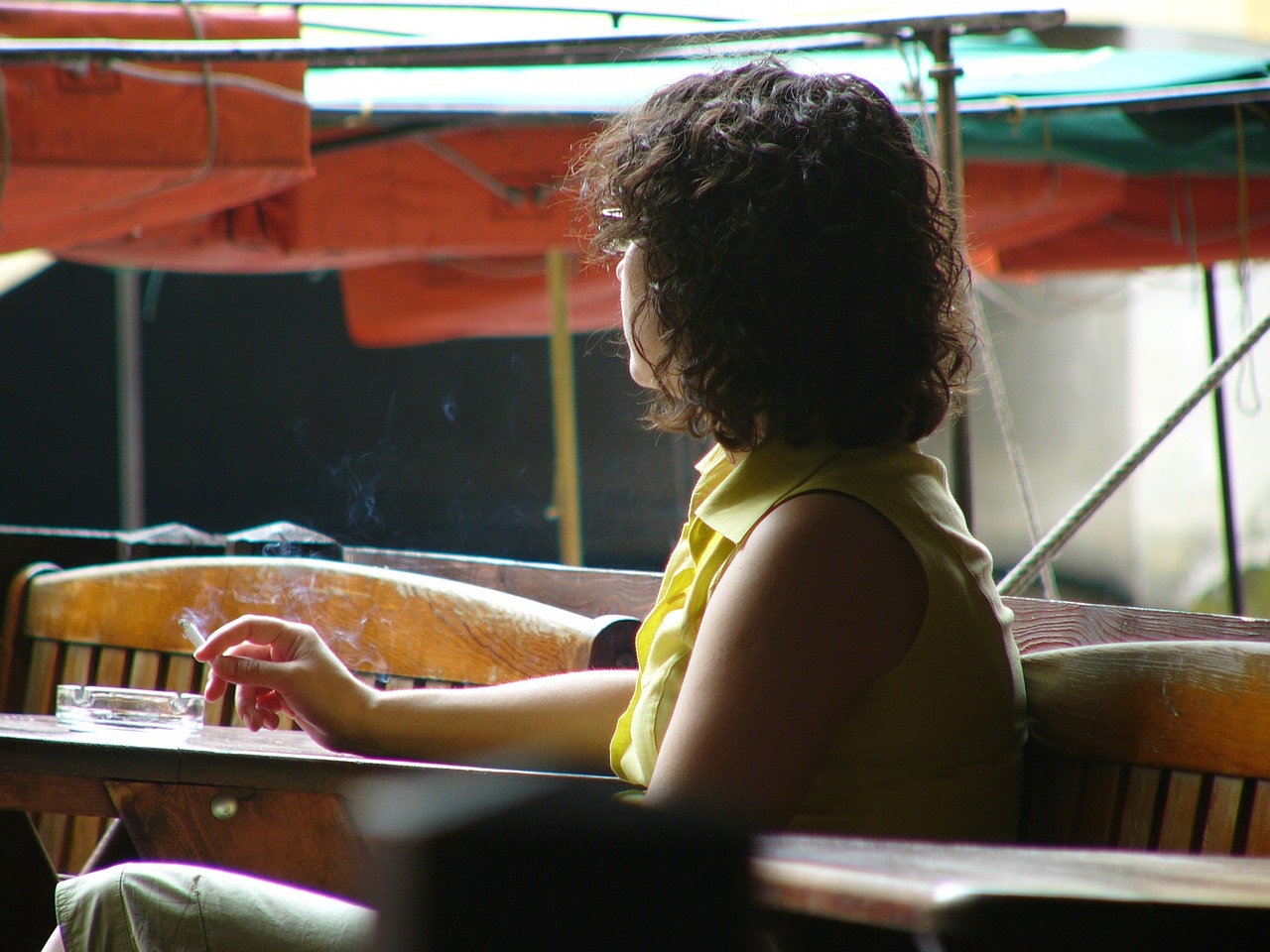 girl thoughtful woman with a cigarette free photo