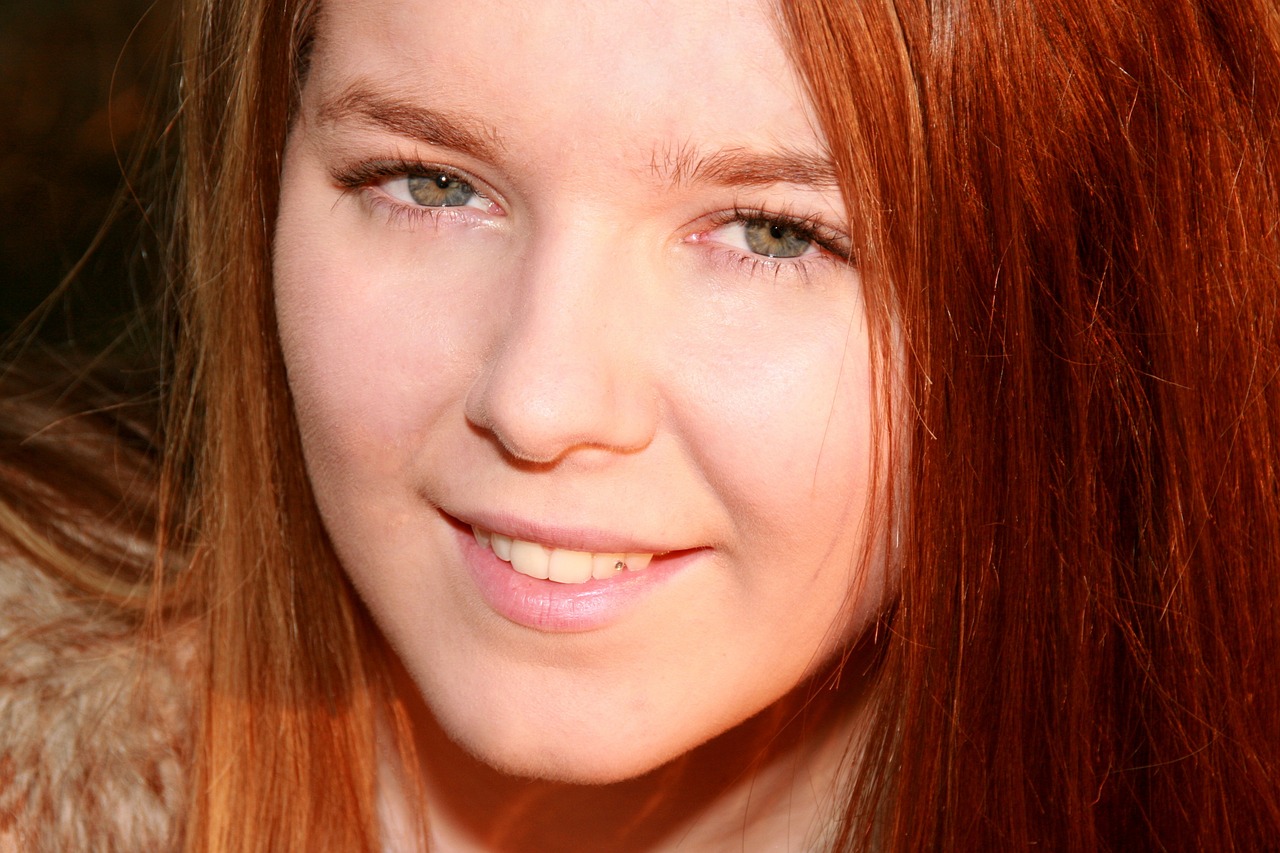 girl red hair green eyes free photo