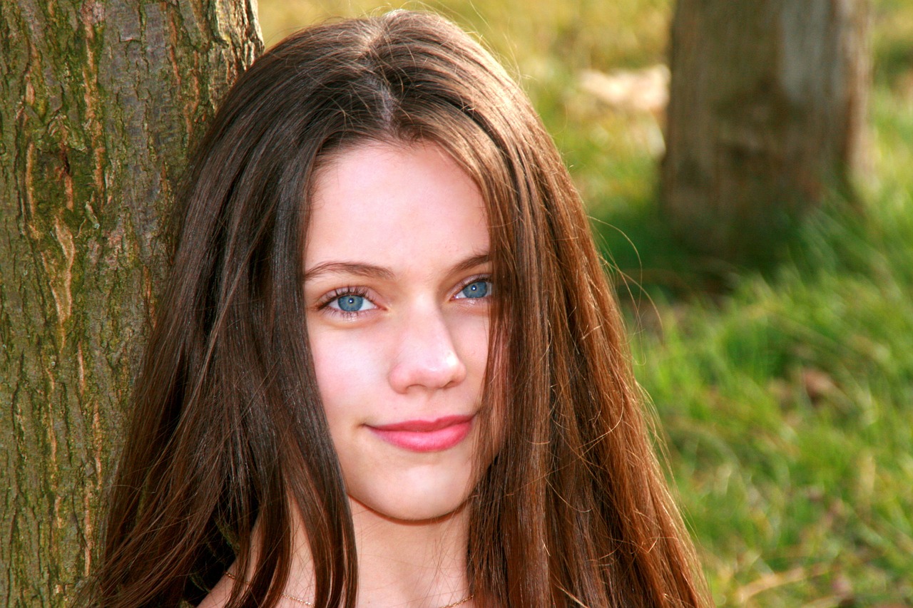 girl blue eyes tree free photo