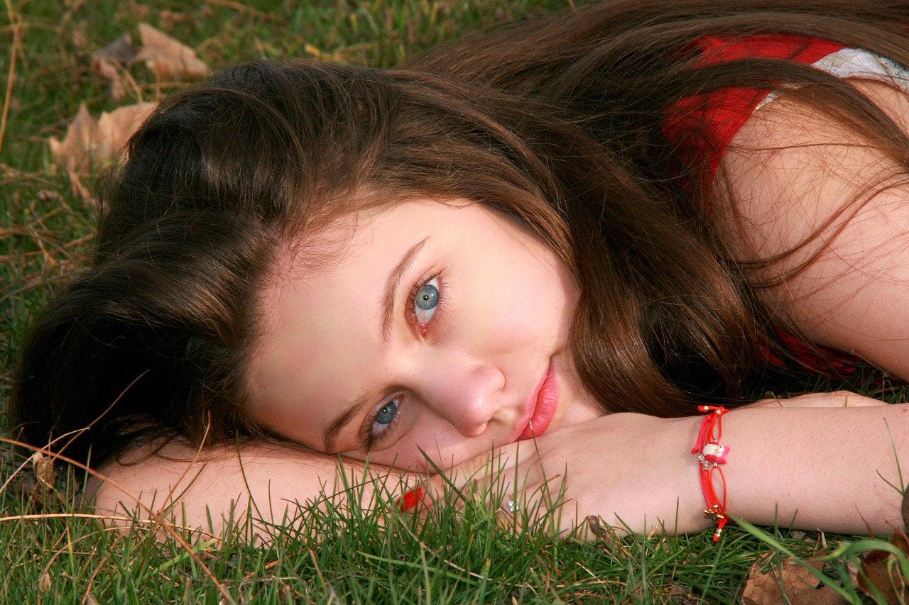 girl grass blue eyes free photo