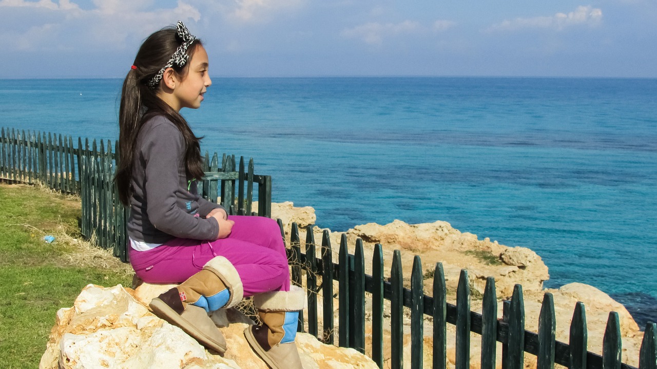 girl gazing sea free photo