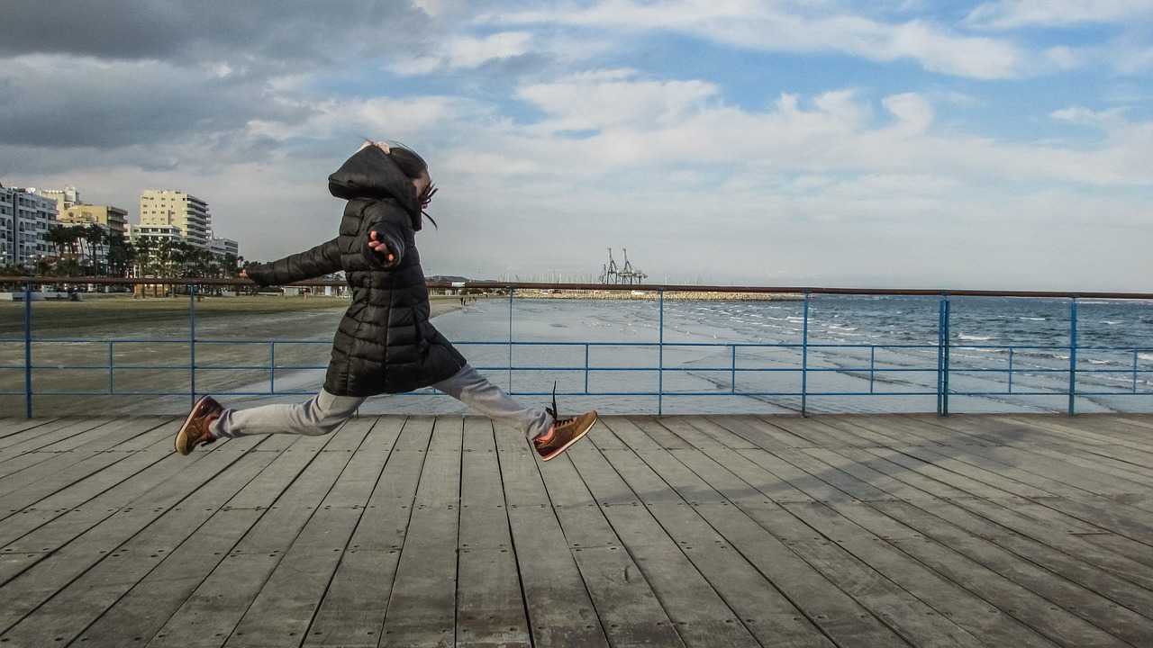 girl playing jump free photo