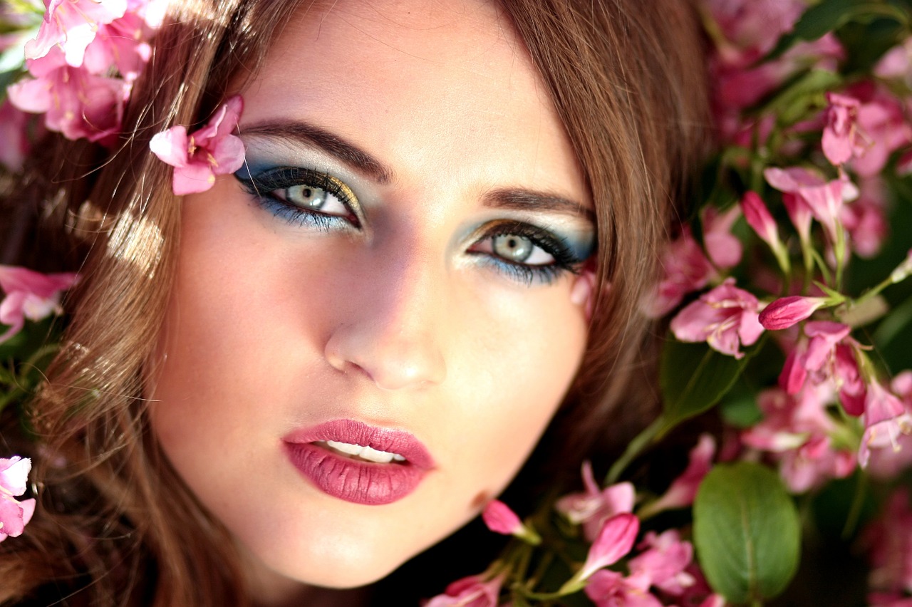 girl blue eyes flowers free photo