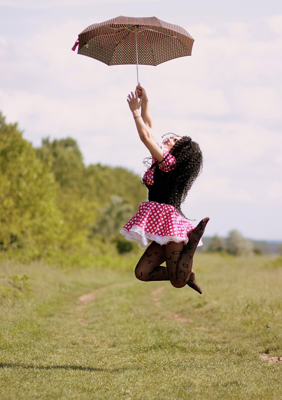 girl umbrella bounce free photo