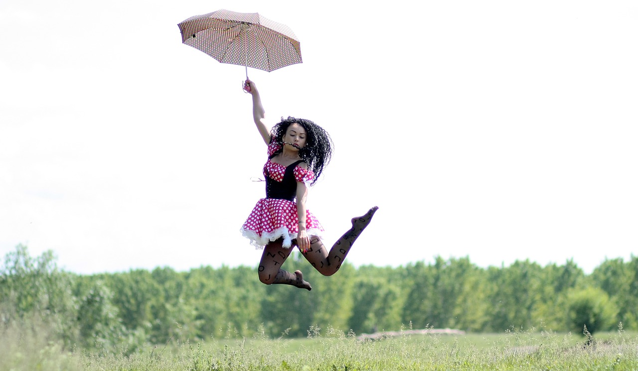 girl umbrella bounce free photo