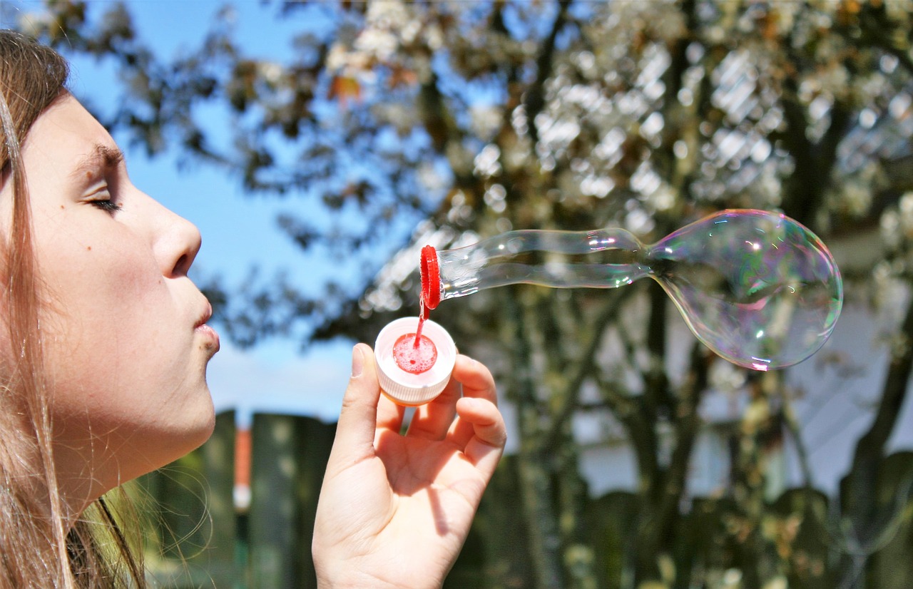 girl soap bubbles play free photo