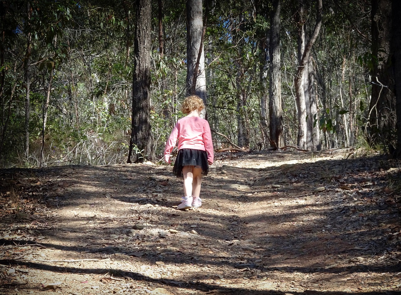 girl walking outdoors free photo