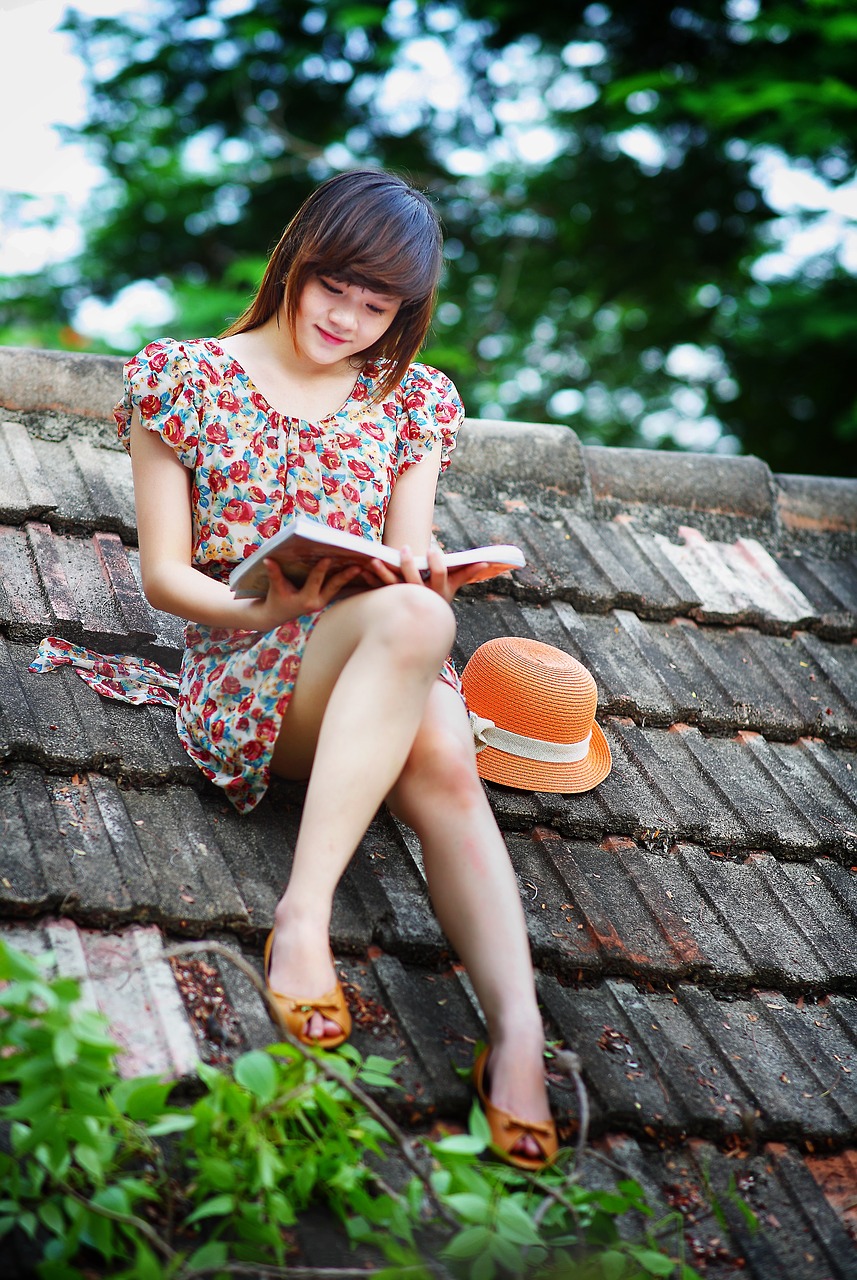 girl reading book free photo