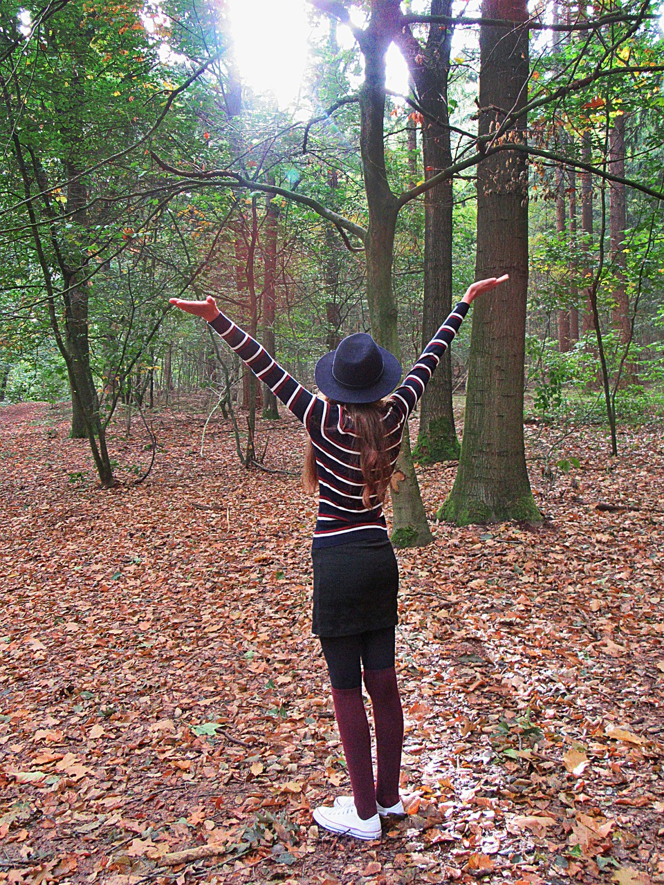 girl wonderingly forest free photo