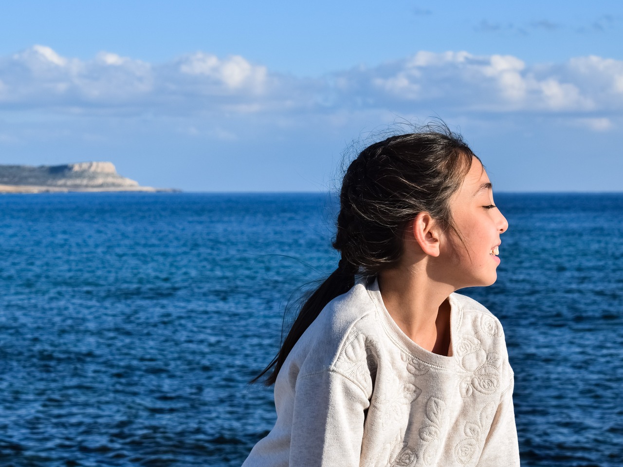 girl enjoying sunshine free photo