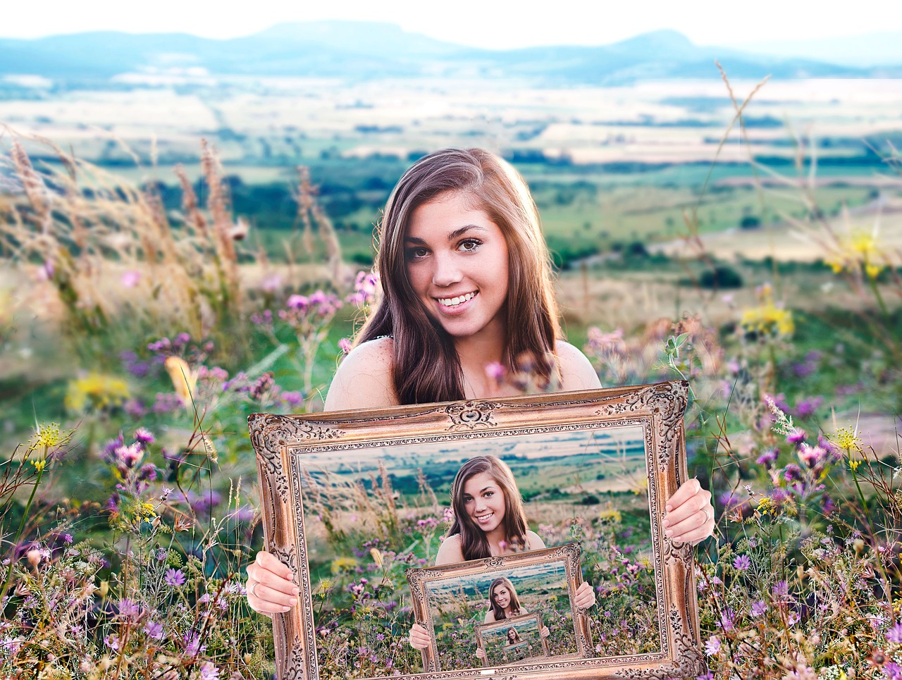 girl holding a frame portrait free photo