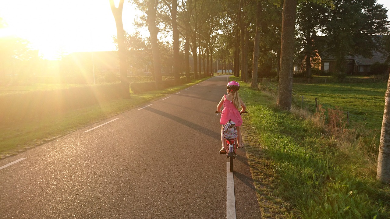 girl riding bicycle free photo