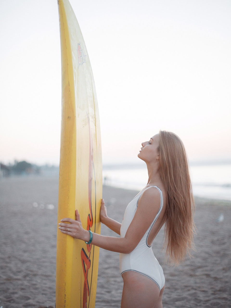 girl surfing board free photo